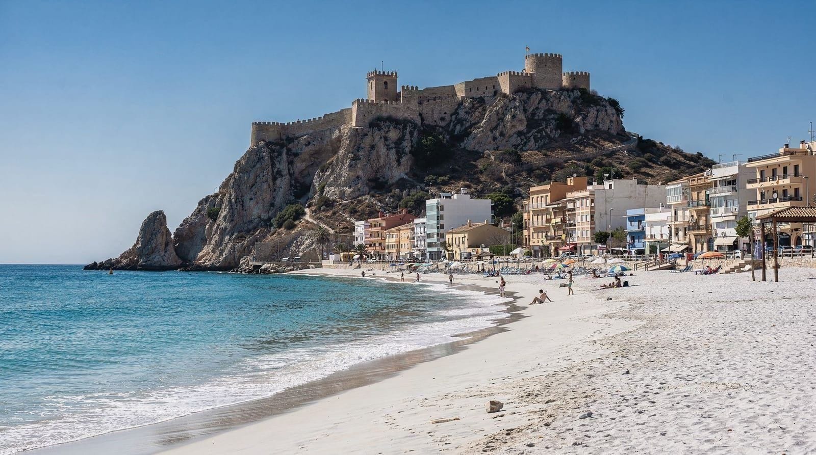 Cullera beaches: castle views, calm lagoon, and day-trip guide — Cullera beaches from Valencia: Platja de Cullera, Estany lagoon, castle, and the